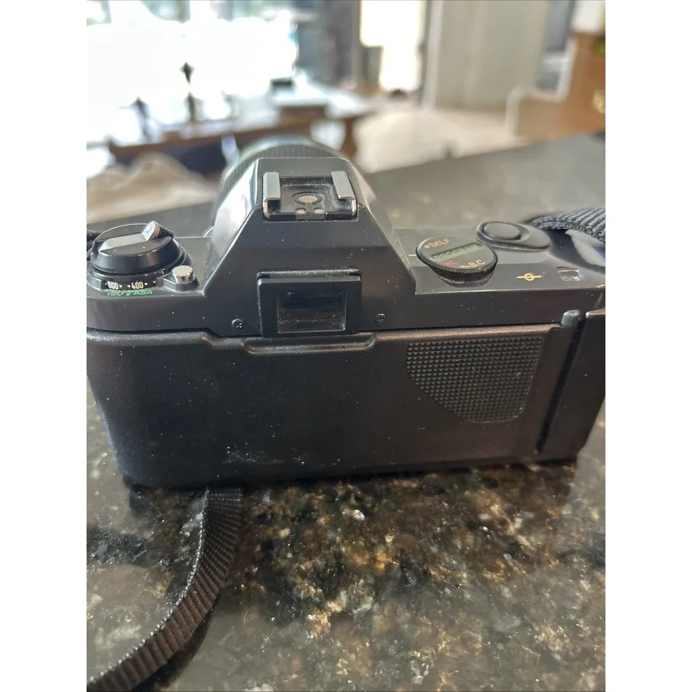 Canon T50 WITH Quantaray 7‎ 1:4~5.6 f-70~210 mm 52mm Camera Zoom Lens